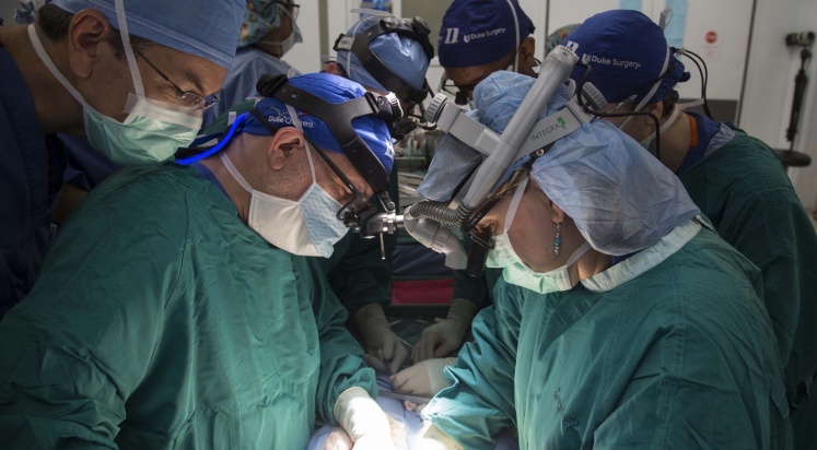 Drs. Rice and Sudan performing surgery