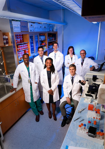 Clockwise from left: Drs. Kevin Southerland, Andrew Barbas, Nicholas Andersen, Georgia Beasley, Michael Lidsky, David Brown, and Lola Fayanju. 