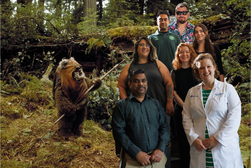 Crosby lab members in front of Ewok backdrop