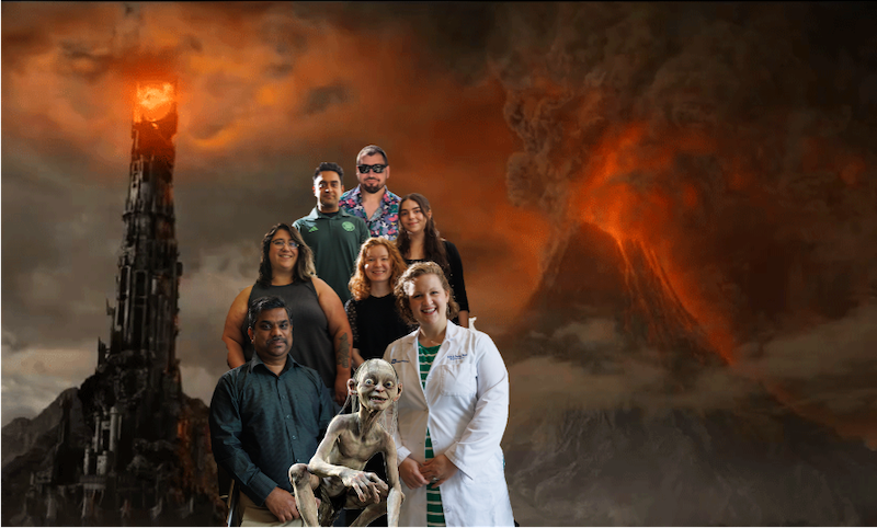 Crosby lab members in front of Lord of the Rings backdrop