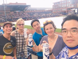 Group of people at a baseball game