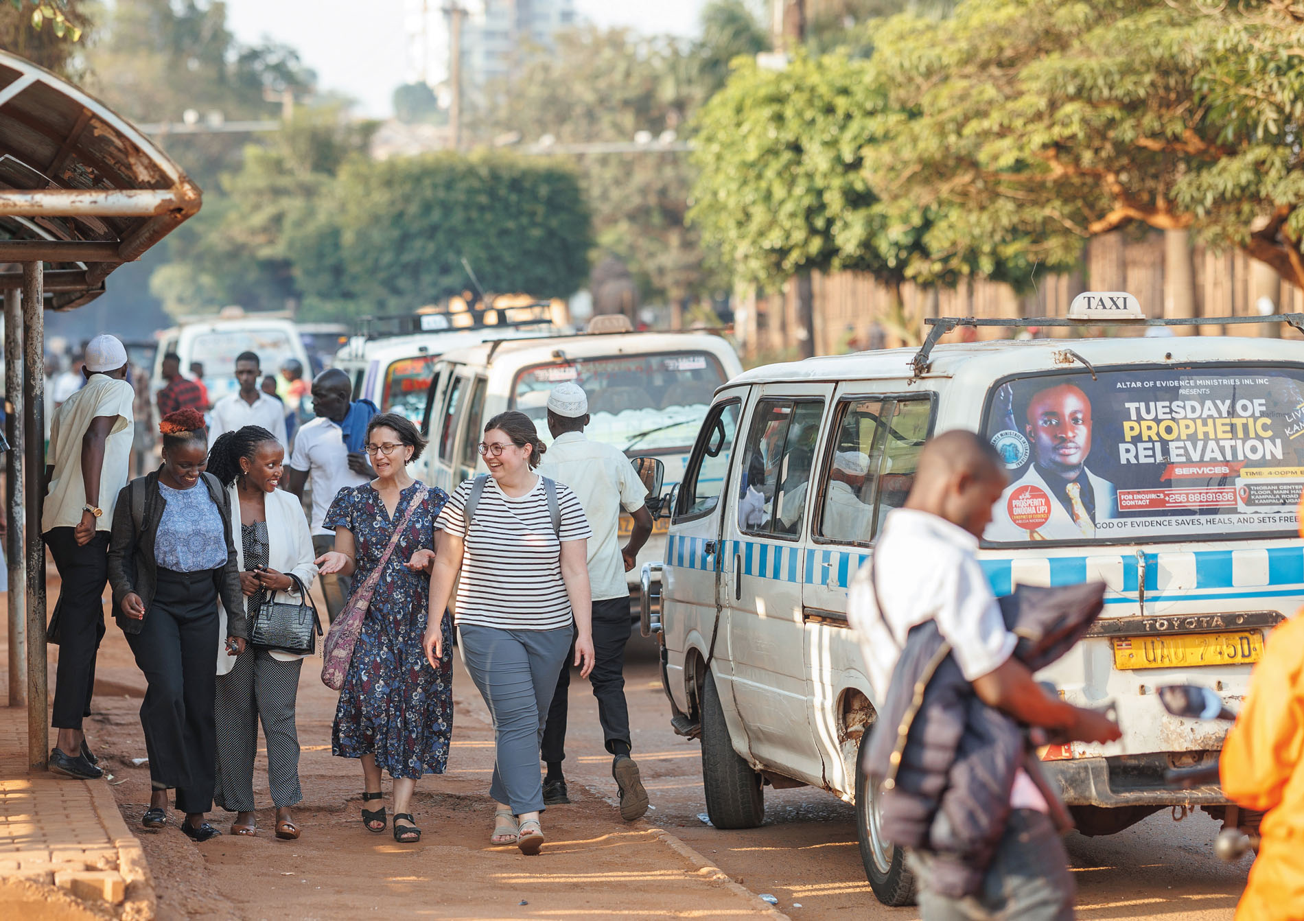 People walking on a street in Kampala, Uganda