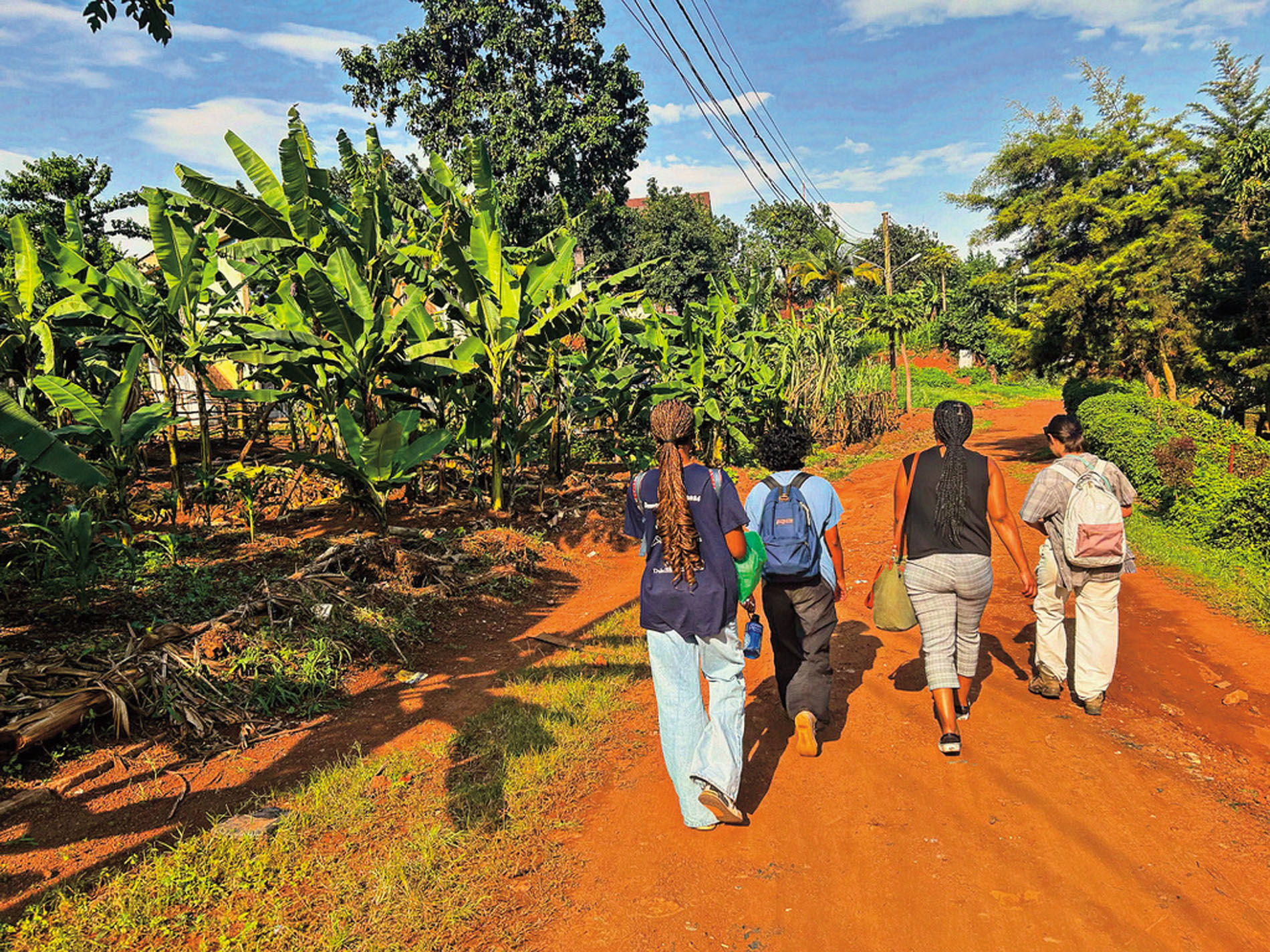 After a day working on KeySuite, Duke students make their way back to their lodgings in Uganda.