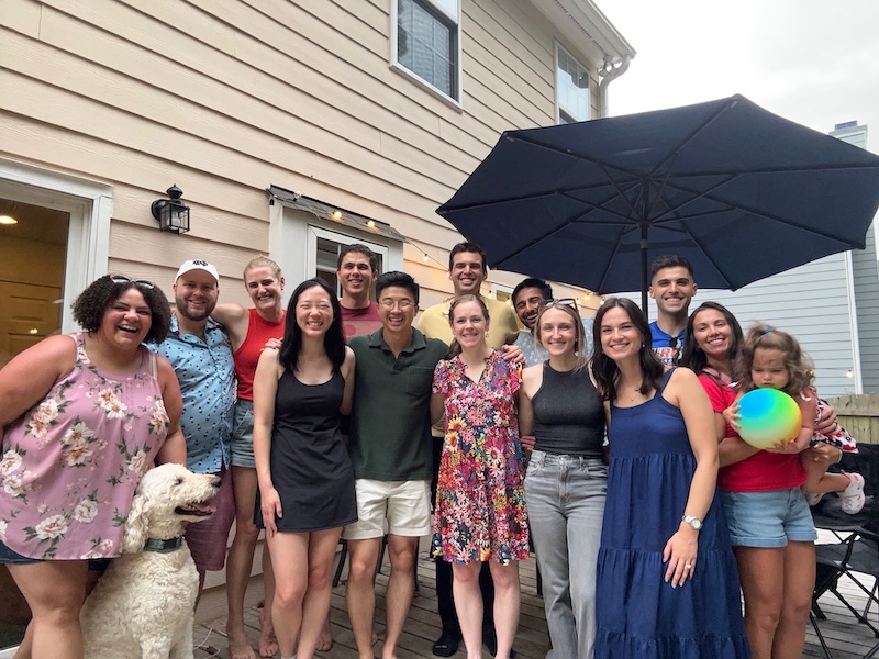 Group photo at an outdoor restaurant