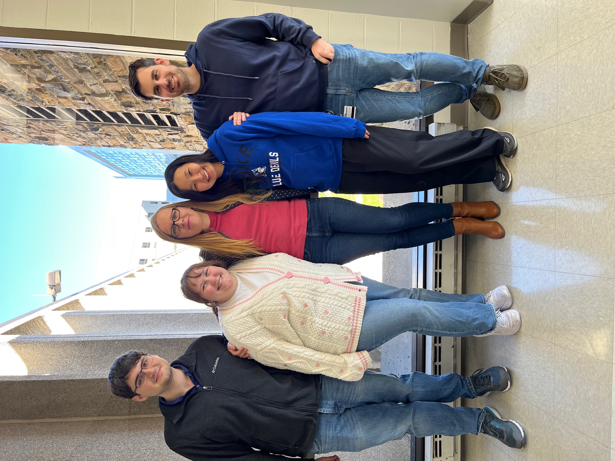 A group of people pose for a photo together
