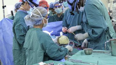 The Duke University Hospital surgical team works to implant an artificial heart in a 39-year-old patient.