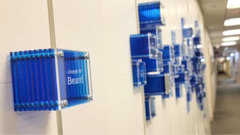 An installation recognizing recipients of federal grants in Duke Surgery 