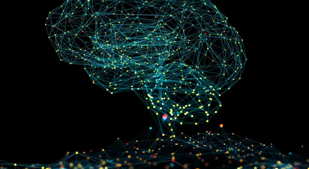 Graphic depiction of artificial intelligence and machine learning in the shape of a brain