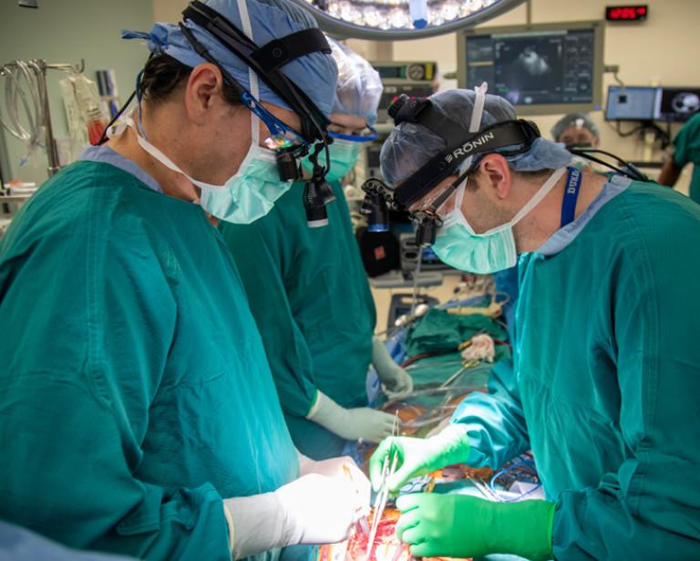 Cardiothoracic surgeons perform a heart transplant