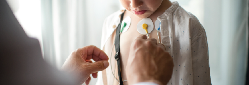 a pediatric patient is examined by a physician