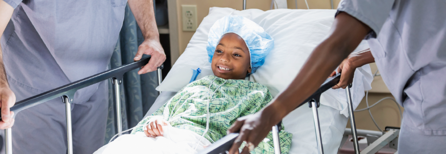 Child patient in hospital bed