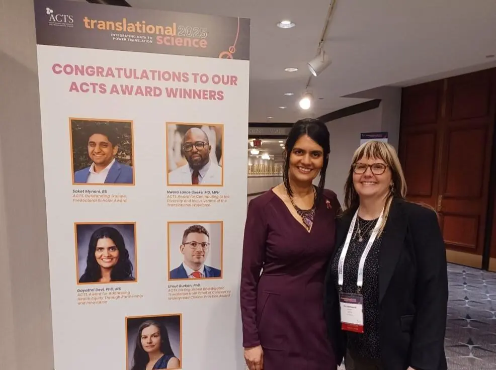 Gayathri Devi receives an award from ACTS