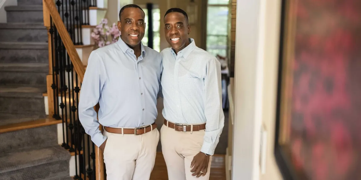 Twins Jamont and Javon Beatty stand inside Jamont's home in Durham, NC