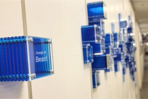An installation recognizing recipients of federal grants in Duke Surgery