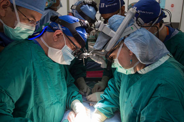 Dr. Debra Sudan performs a surgery with a team in Singapore