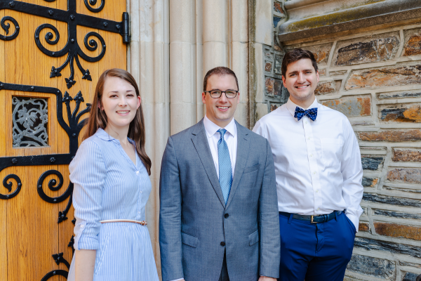 Abby van Vliet, Dr. Ryan Antiel, and Dr. Thomas Howell stand in a group photo