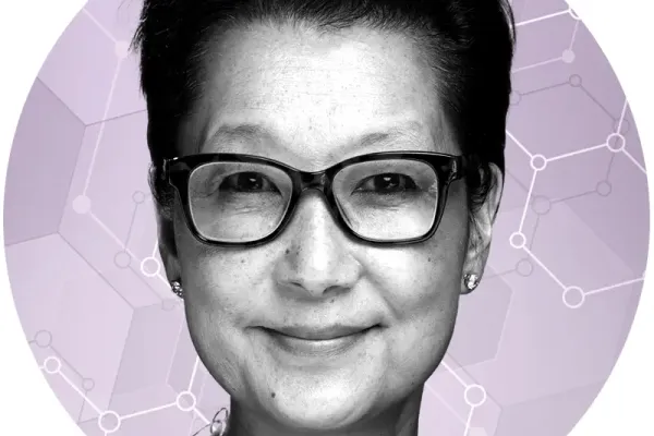 Black and white photo of Dr. Shelley Hwang over a pink illustration background
