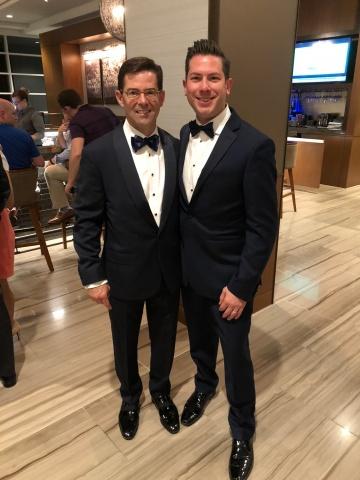 Dr. Brett Phillips and Dr. Jeffrey Marcus, both in suit and tie