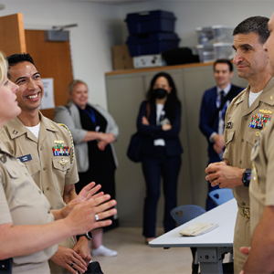 Officials from the U.S. Navy Medicine converse at Duke Health