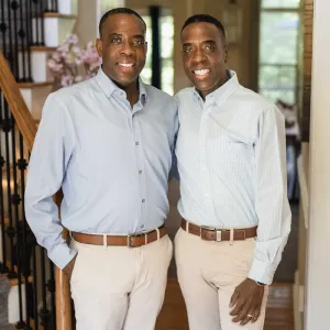 Twins Jamont and Javon Beatty stand inside Jamont's home in Durham, NC